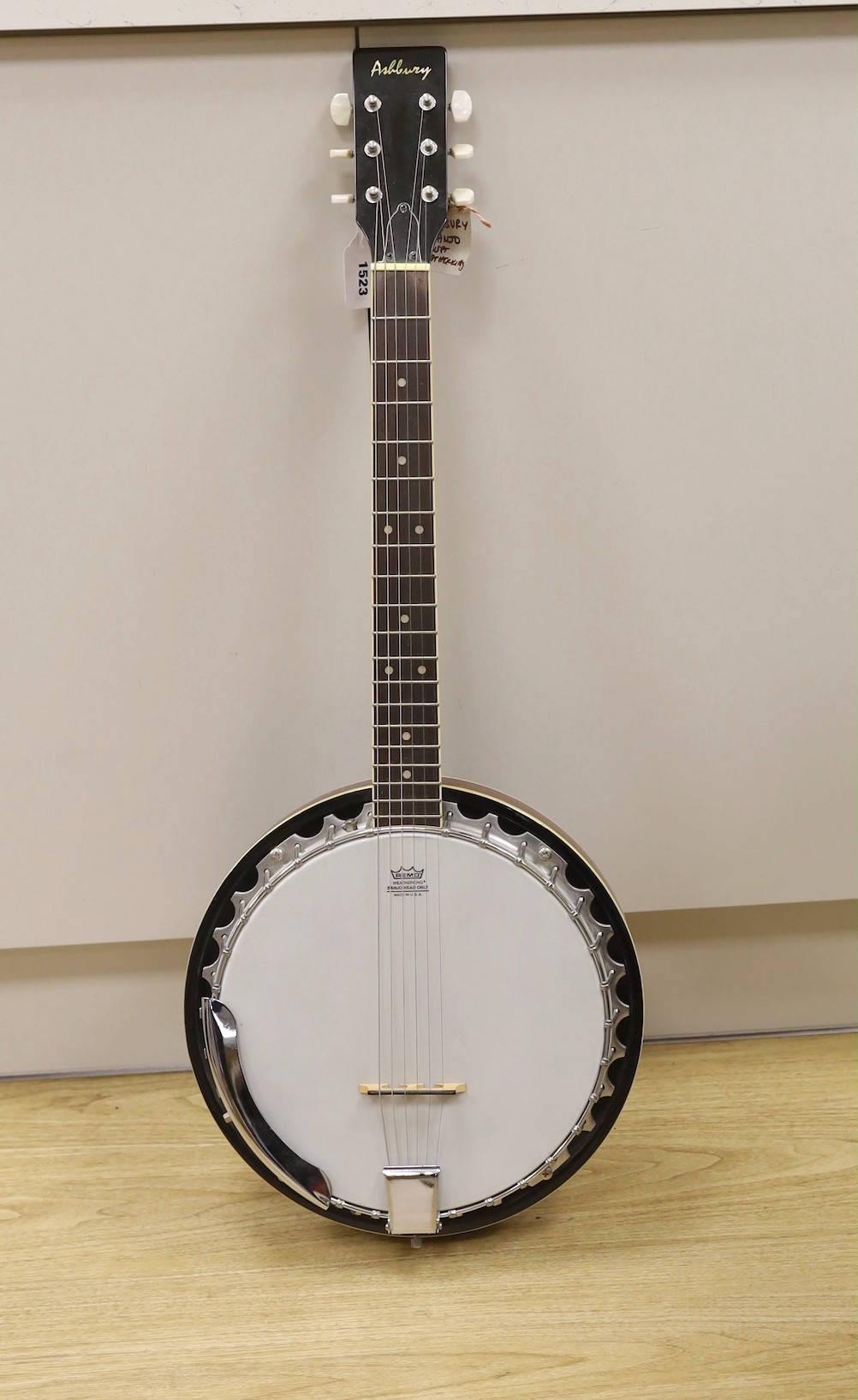 An Ashbury banjo - U.S.A. Weatherking with soft padded case, Banjo 86.5 cms high